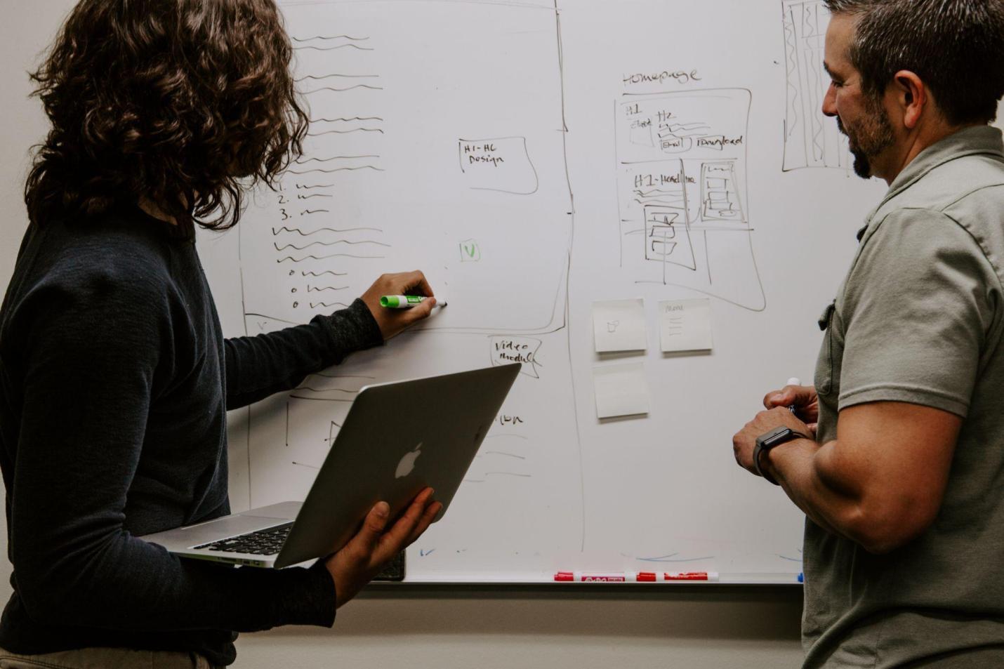 People calculating for an engineering design solution