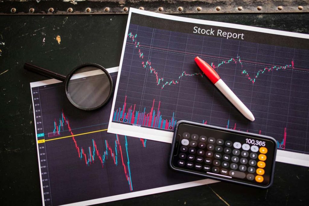 Phone and trading charts